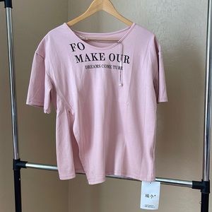 Cotton short sleeve . It’s really cute and soft